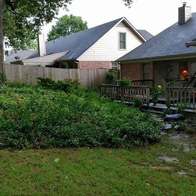 Shaded backyard w/deck