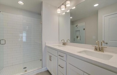 Traton's Designer selected high end finishes in this beautiful primary bathroom.