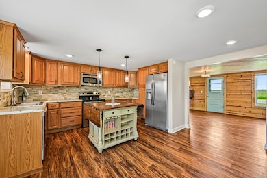 Kitchen opens to Living Room