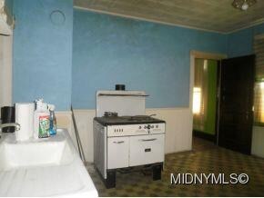 Gas Stove & Refrig included.