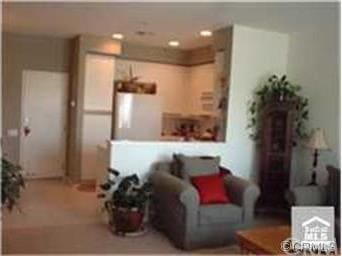 LIVING ROOM OPENS TO KITCHEN & DINING