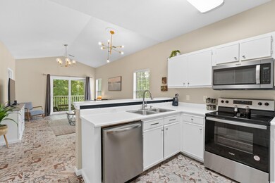 Kitchen featuring appliances with stainless steel 