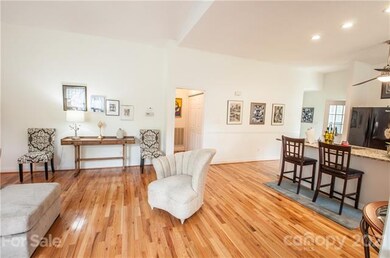 Open floor plan with beautiful hard wood floor