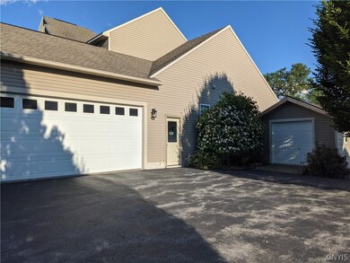 Side load oversized garage and even a shed for ext
