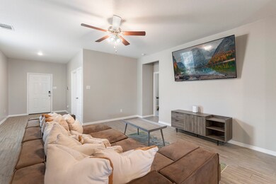  Family room features tile flooring and spacious l