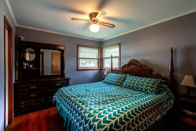 Master Bedroom with attached 1/2 Bath. Large enoug
