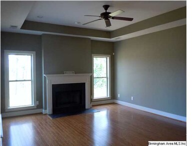 Great room in the back of the home with the view s