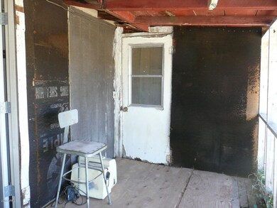 Storage room off front porch