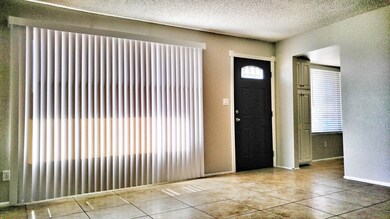 1544 E Hilton Ave 05 - Family Room 1
