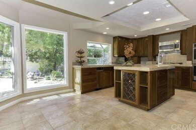 BIG KITCHEN NOOK, CENTER ISLAND, CUSTOM PANTRY AND
