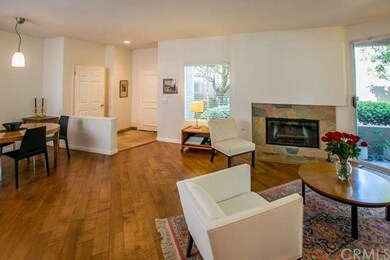Gas Fireplace and Dining Room open to Living Room 