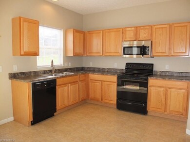 Open kitchen with oven, range, dishwasher, over th