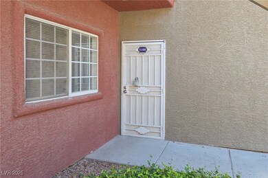 Property entrance featuring stucco siding