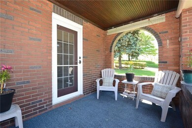 The porch is off the living room.