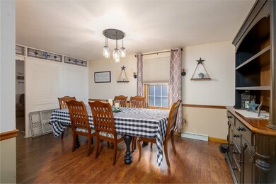 Dining Room Also Features Unique Louvered Divider