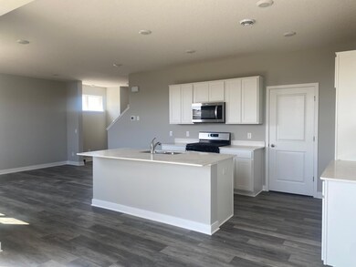 Photo is of the actual home.  Check out the large island!