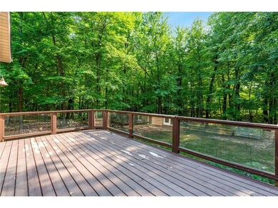 Large deck overlooking the backyard -- enjoy the l