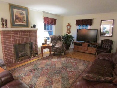 Gorgeous Living Room with fireplace & hardwoods