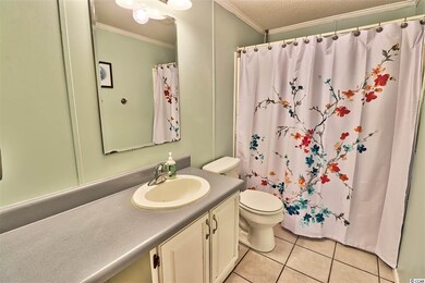 1045 Putting Ln, Carolina Shores, SC 28467 - photo 7