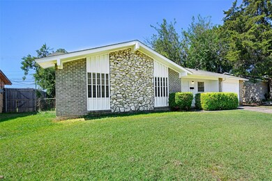 Ranch-style house with a 1 car garage and a big fr