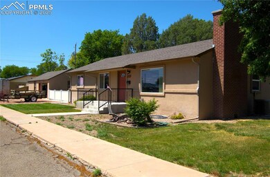 Ranch-style home with stucco siding