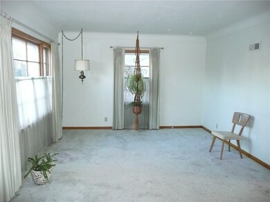 Living room  (Hardwood under carpet)