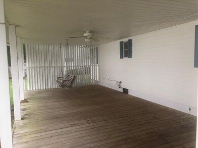 Covered back porch with long view of lake