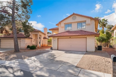 Mediterranean / spanish-style house with driveway, an attached garage, a tile roof, and stucco siding