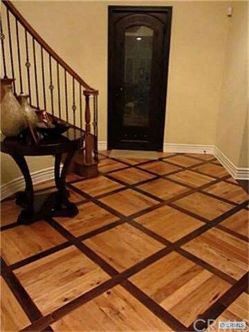 Custom iron door & beautiful hard wood floors