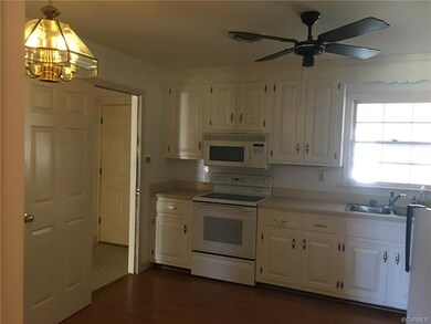 Kitchen with an attached hall to second master, la