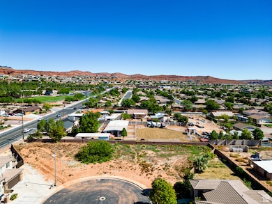 Aerial view of residential area featuring mountains