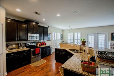 Kitchen with Touch-Less Faucet and Backsplash