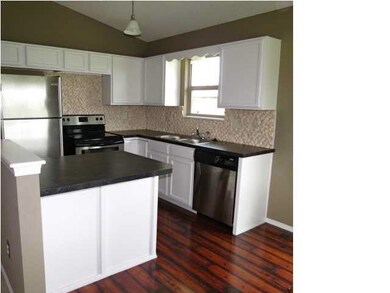 Appliances remain with home, including washer and 