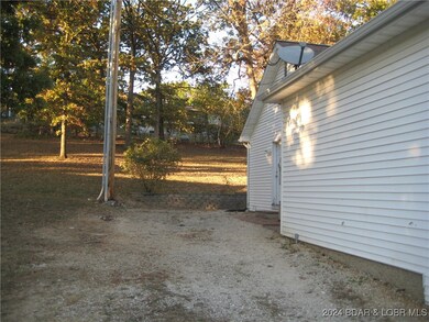 Extra Parking in Side Yard with RV Hookups