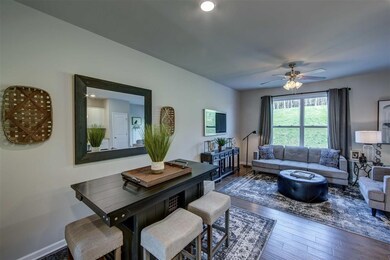 Lots of cabinets and island seating.  Granite and 