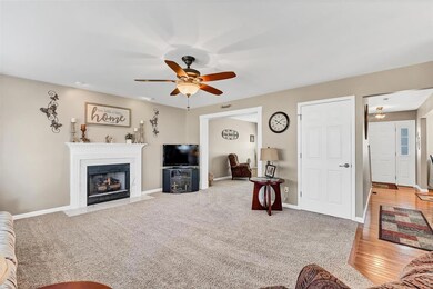 Cased Opening to the Front Room & Hardwood Floors 