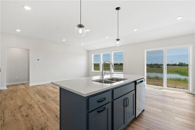 Photo is of a previously built home, this home will include a fireplace in living room. 