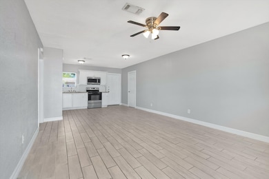 Welcome to a bright and spacious living area, seam