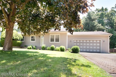 Attached oversized garage & paver drive