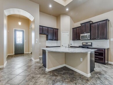 Bright and roomy kitchen with skylight, no need for lights until dark!