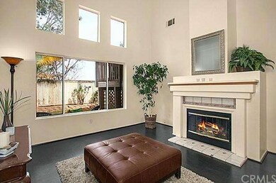 Living Room; Lots of natural light, vaulted ceilin