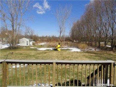 Backyard. 12 x 18 shed has an overhead door and a 