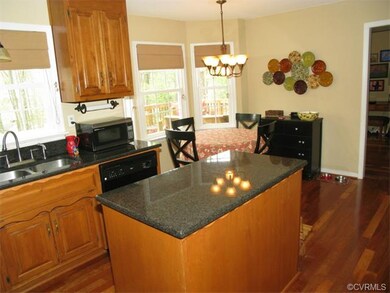 CUTOM RAISED PANEL CABINETS~GRANITE TOPS