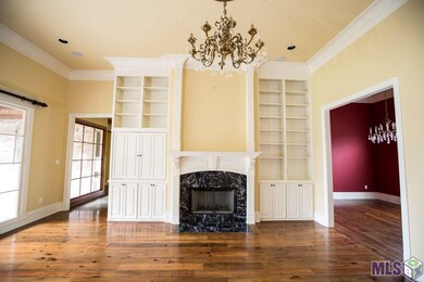 CHECK OUT THE BEAUTY OF THIS AWESOME DEN AREA!!!  12' SOARING CEILINGS WITH CROWN MOLD IS A GREAT SPACE TO ENTERTAIN AND JUST RELAX AFTER A HARD DAYS WORK!!!1