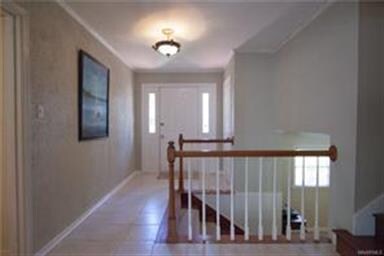 The Foyer has been freshly painted in a soft grey 