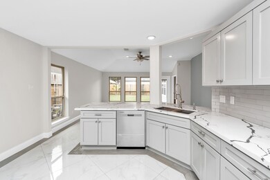 Kitchen with quartz countertops and new appliances