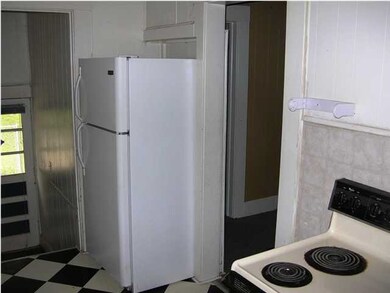 Kitchen w/ Stove & Fridge