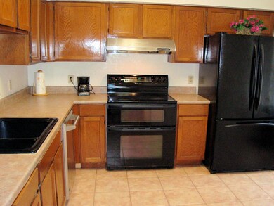 Kitchen is equipped with upscale stove with double