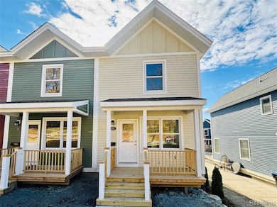 View of front of property featuring board and batten siding and a porch