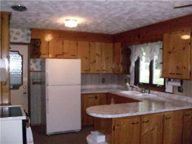 Kitchen. View of the eat-in kitchen, w/ pine cabin